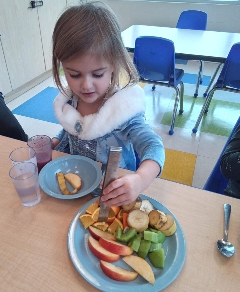 Mila getting her food