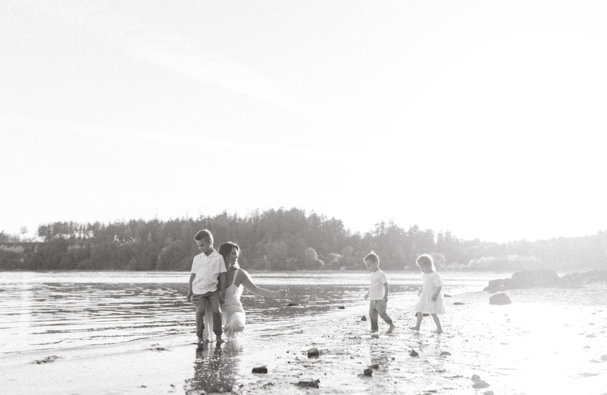 Natasha and 3 kids on the beach