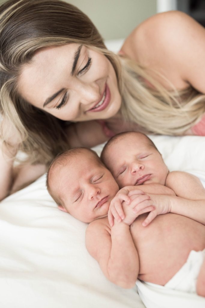 Natasha looking at sleeping twins